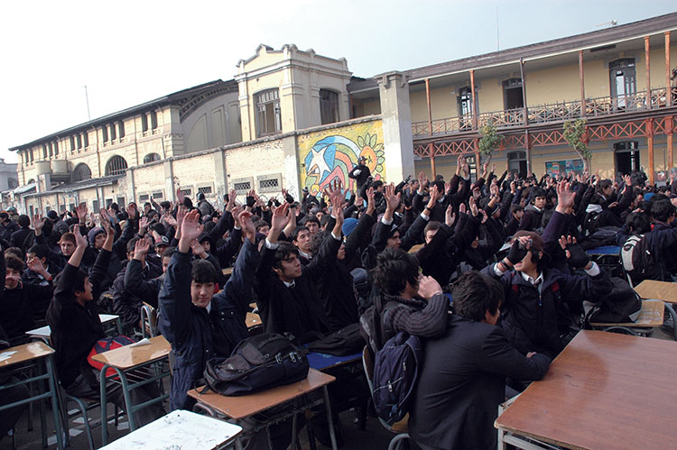 Students protest by dragging their desks into the school quad duringthe 2006 "Penguin Revolution." (Photo byantitezo.)